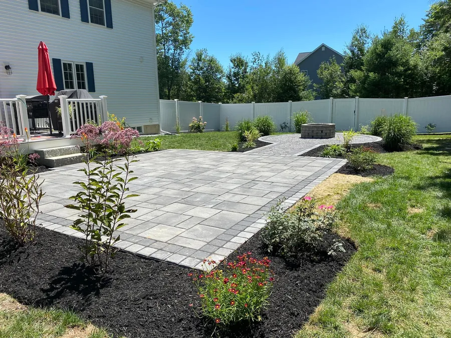 Custom paver patio installed by Kyle Poirier Landscaping LLC in Concord NH